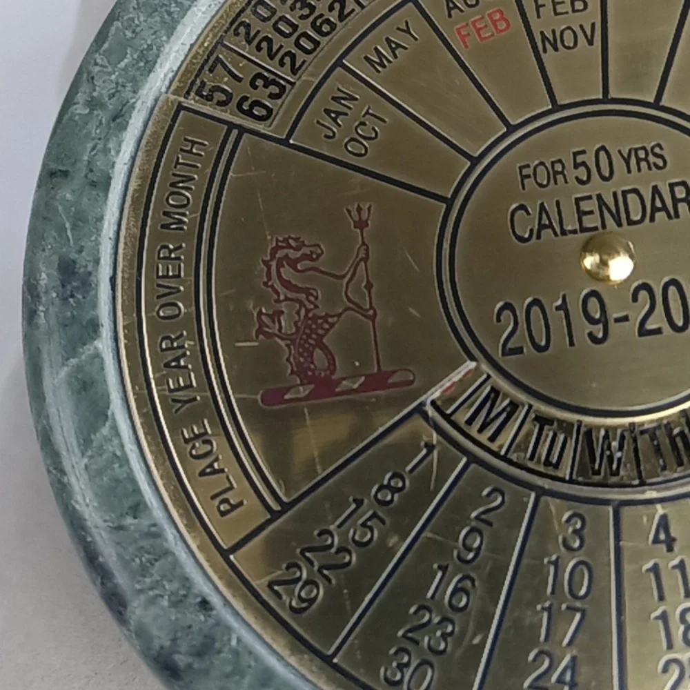 Perpetual Calendar Paper Weight.